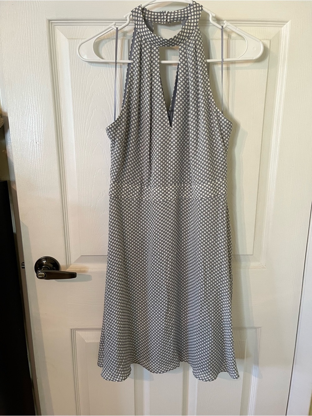 Express fit and flare dress features a gray and white polka dot pattern
